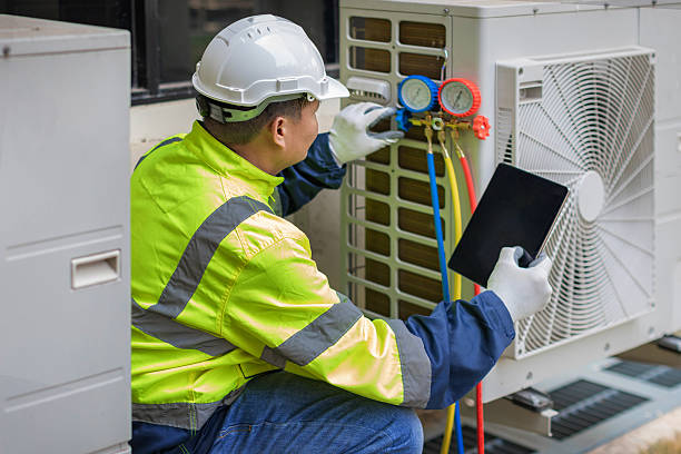 Professional Heat Pump Repair technician working in Johnstown, NY